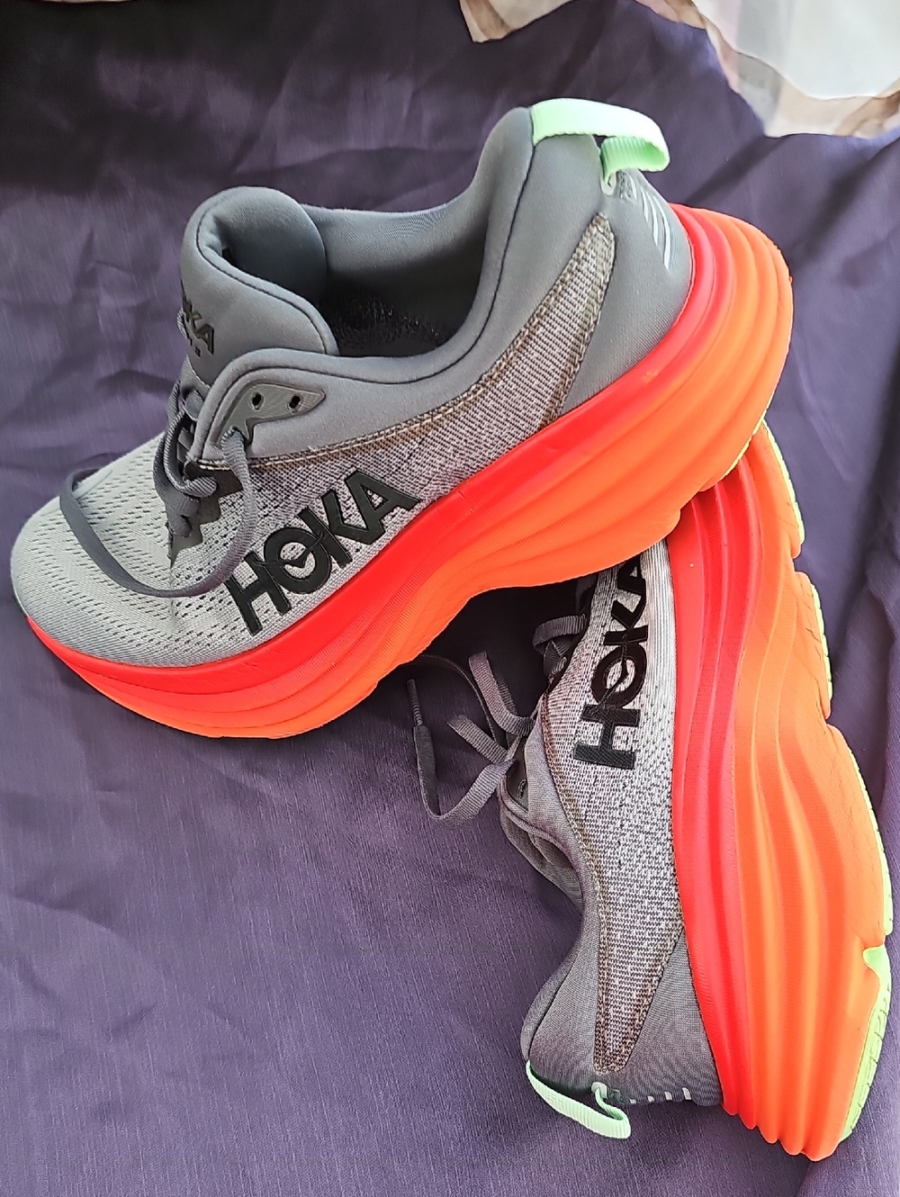 Hoka Men's Grey Knit Trainers with Orange-Red Gradient Sole